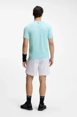 Active moisture-wicking T-shirt with tennis-ball embossing