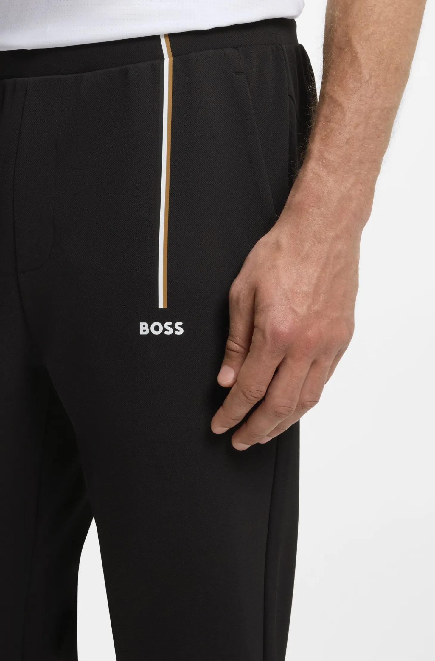 Active tracksuit bottoms in thermoregulating stretch gabardine