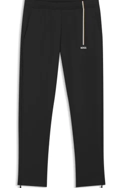Active tracksuit bottoms in thermoregulating stretch gabardine
