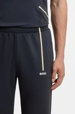 Active tracksuit bottoms in thermoregulating stretch gabardine