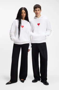 All-gender Cotton-terry hoodie with origami-heart artwork