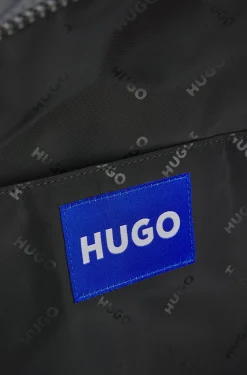 Backpack with blue rubber logo patch