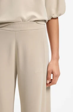 Balloon-fit tracksuit bottoms with logo embroidery