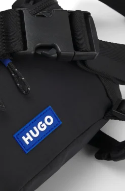 Belt bag with blue logo label