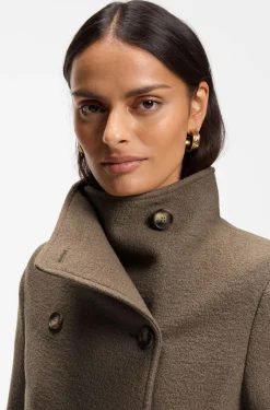 Belted double-breasted coat in virgin wool