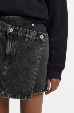Black-denim skirt with asymmetric waistband