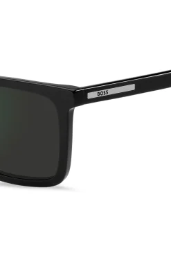 Black sunglasses with engraved logo plaque