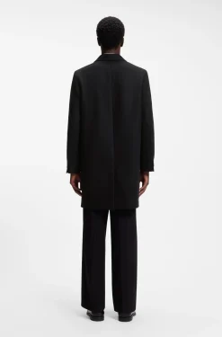 Buttoned coat in a virgin-wool blend