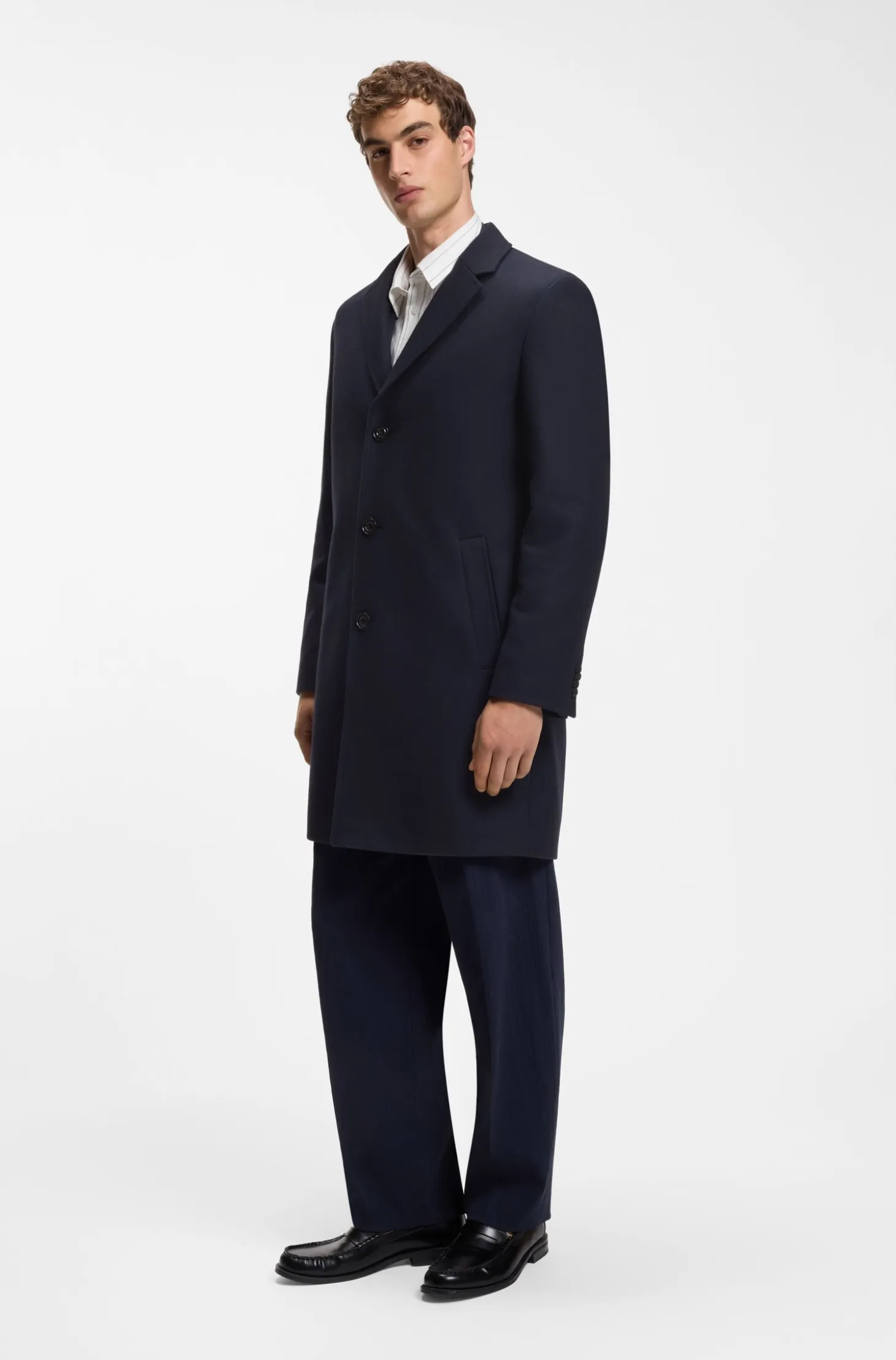 Buttoned coat in a virgin-wool blend