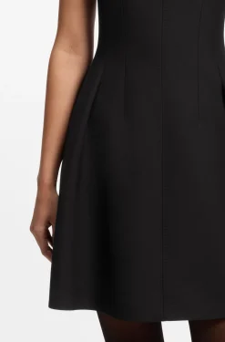 Cap-sleeve dress with pleat details