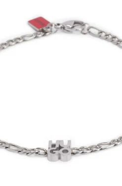 Chain cuff with stacked-logo plaque
