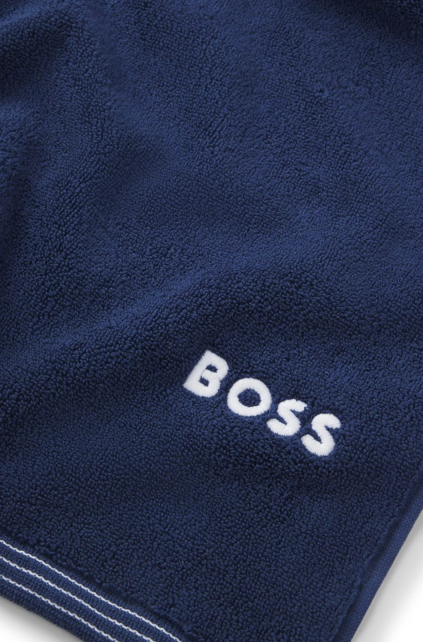 Cotton bath sheet with contrast embroidered logo
