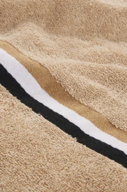 Cotton bath towel with signature-stripe border