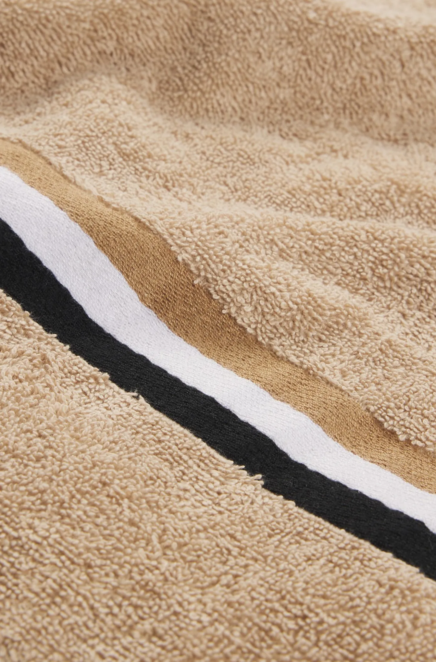 Cotton bath towel with signature-stripe border