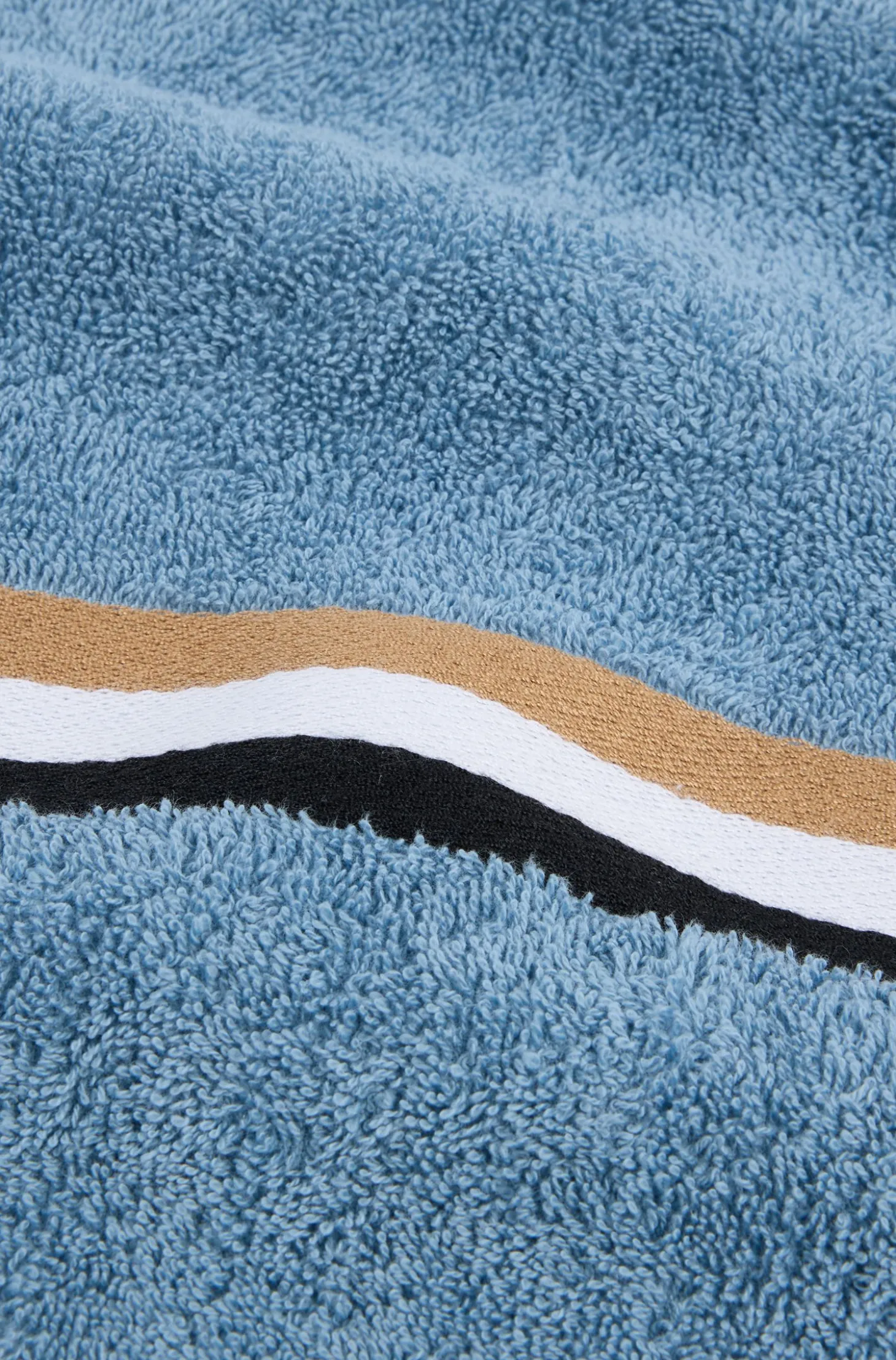 Cotton bath towel with signature-stripe border