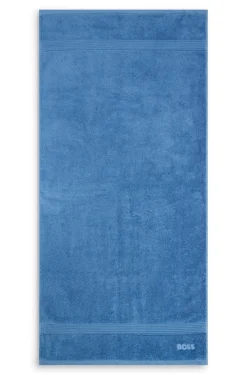 Cotton bath towel with tonal embroidered logo