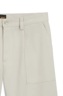 Cotton-blend chinos with pleat and patch pocket