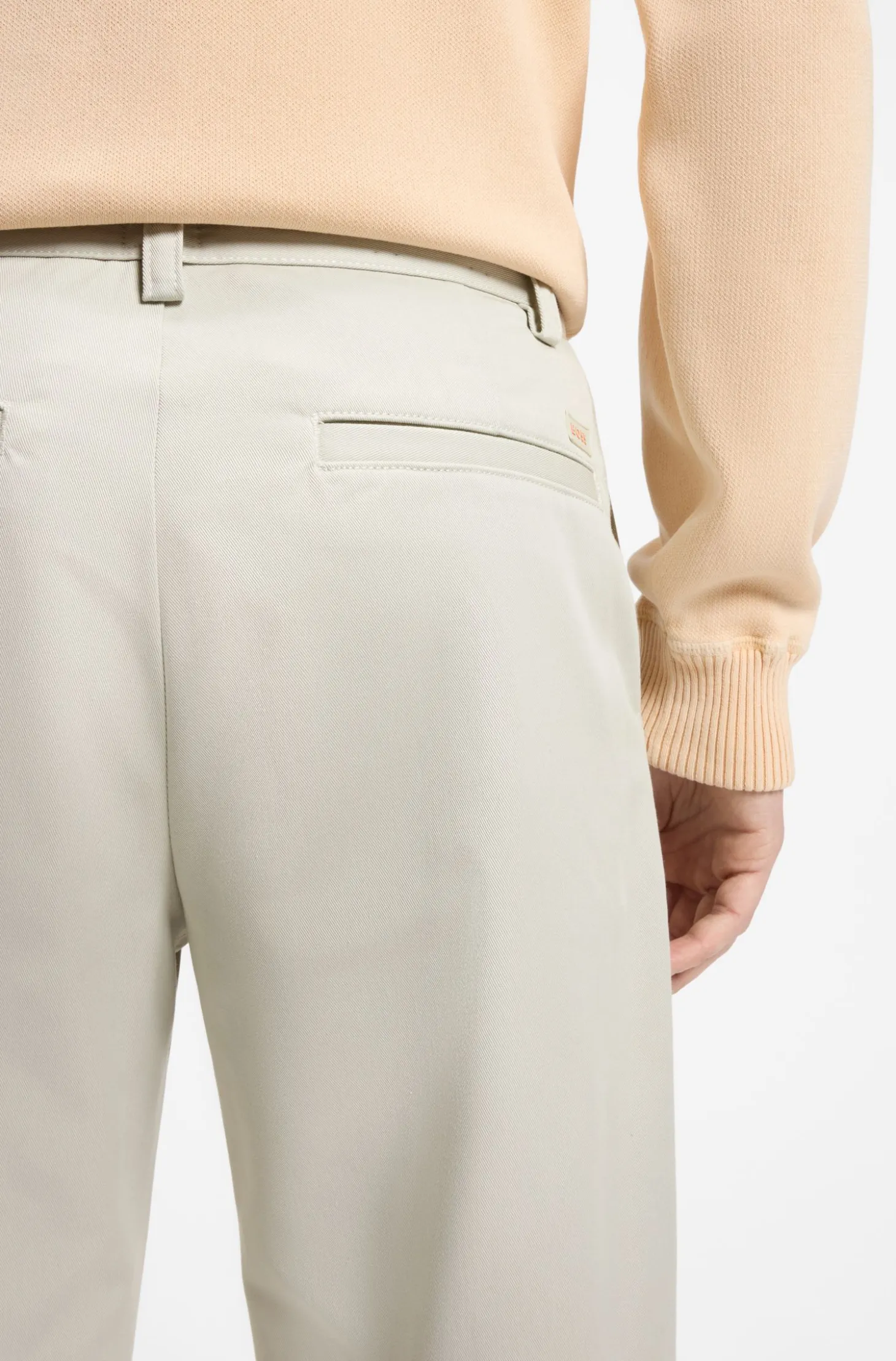 Cotton-blend chinos with pleat and patch pocket