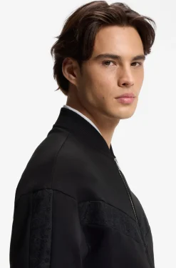 Cotton-blend jacket with broderie stripes