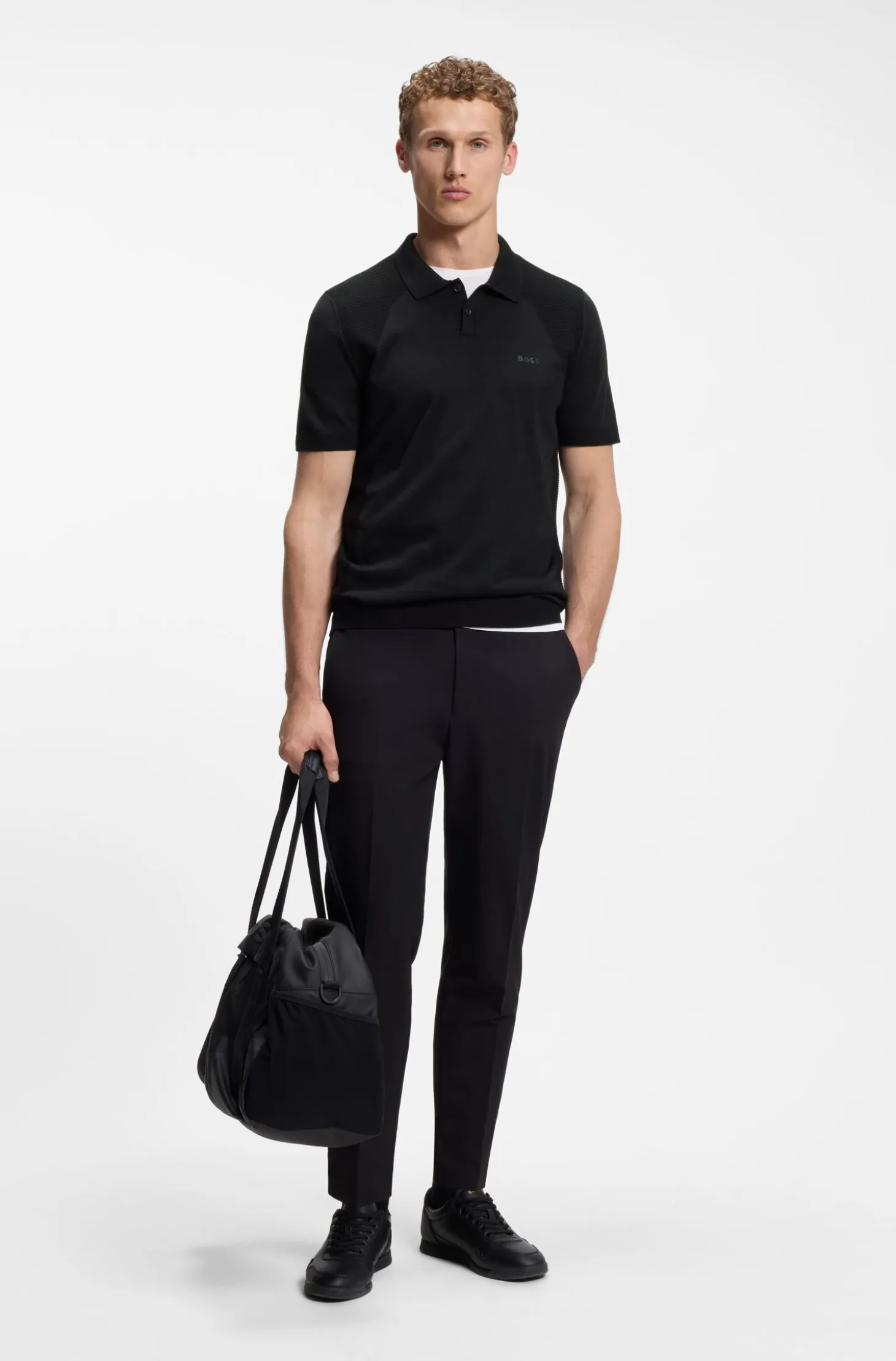 Cotton-blend knit polo with bodymapping structure