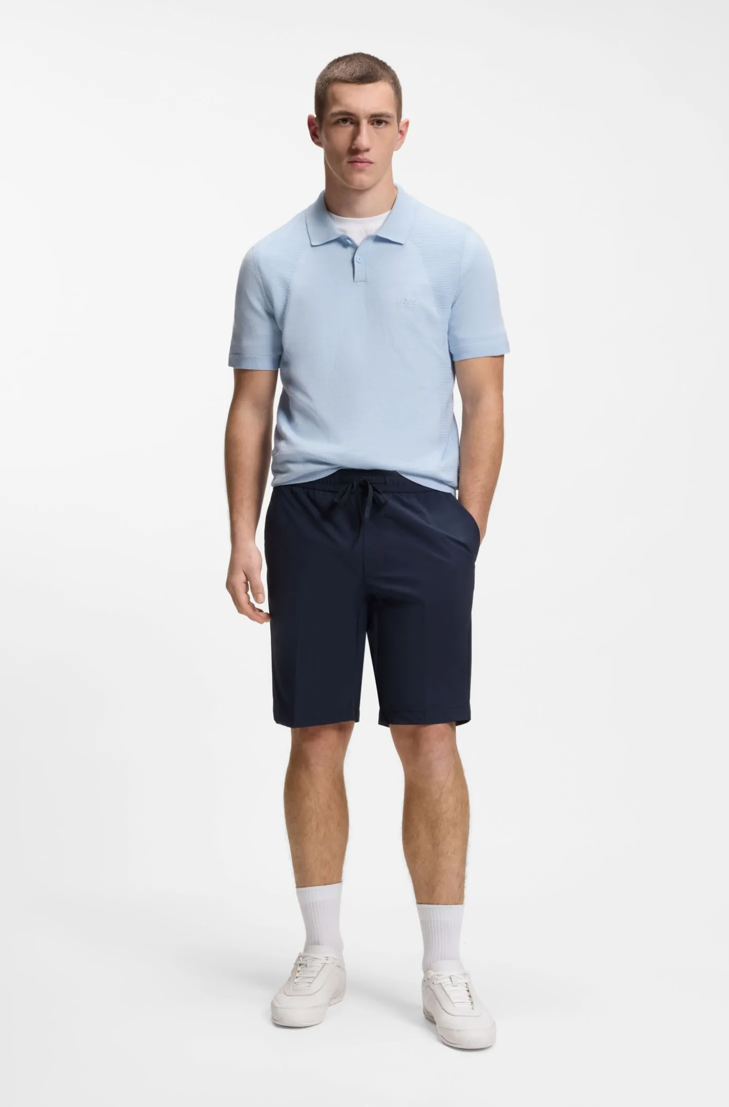 Cotton-blend knit polo with bodymapping structure