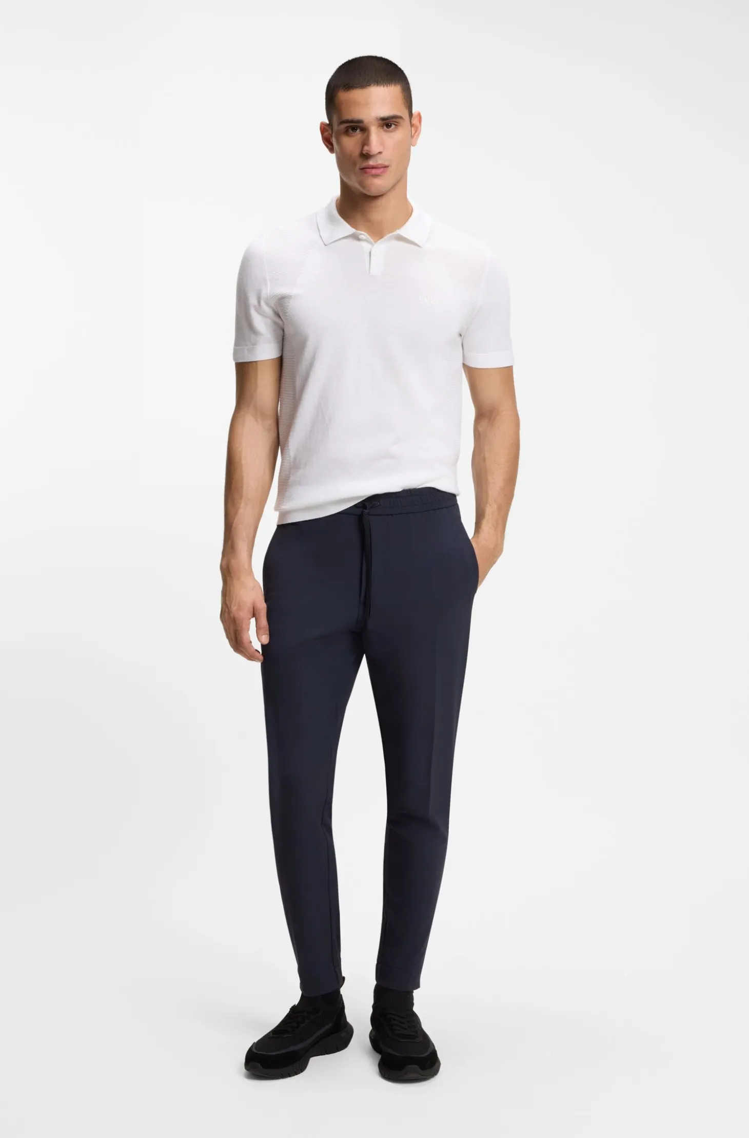 Cotton-blend knit polo with bodymapping structure