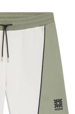 Cotton-blend shorts with embroidered logo artwork