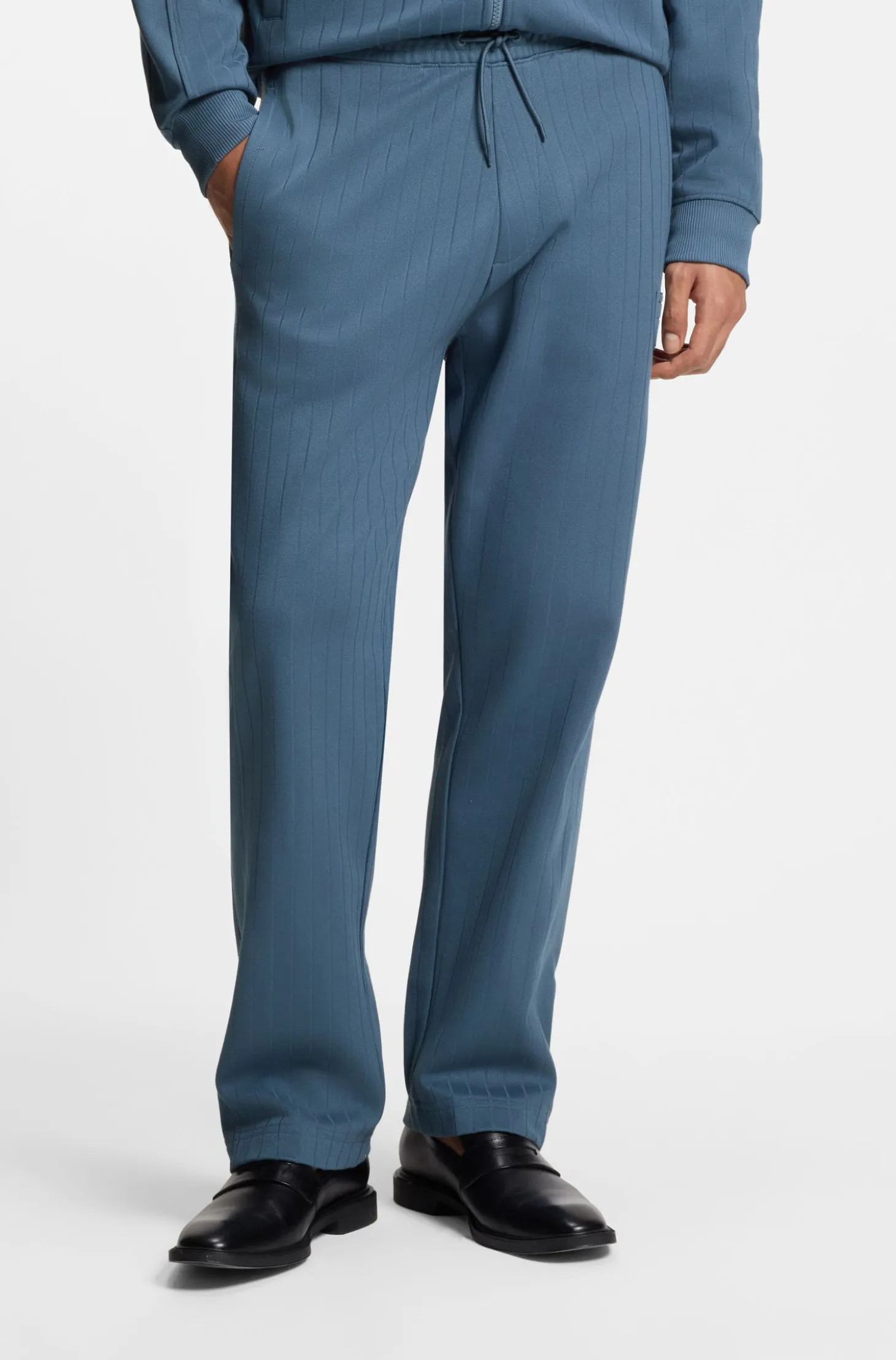 Cotton-blend tracksuit bottoms with drop-needle stripe