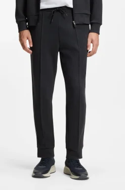 Cotton-blend tracksuit bottoms with piping details