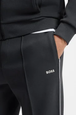 Cotton-blend tracksuit bottoms with piping details