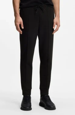 Cotton-blend tracksuit bottoms with piping details
