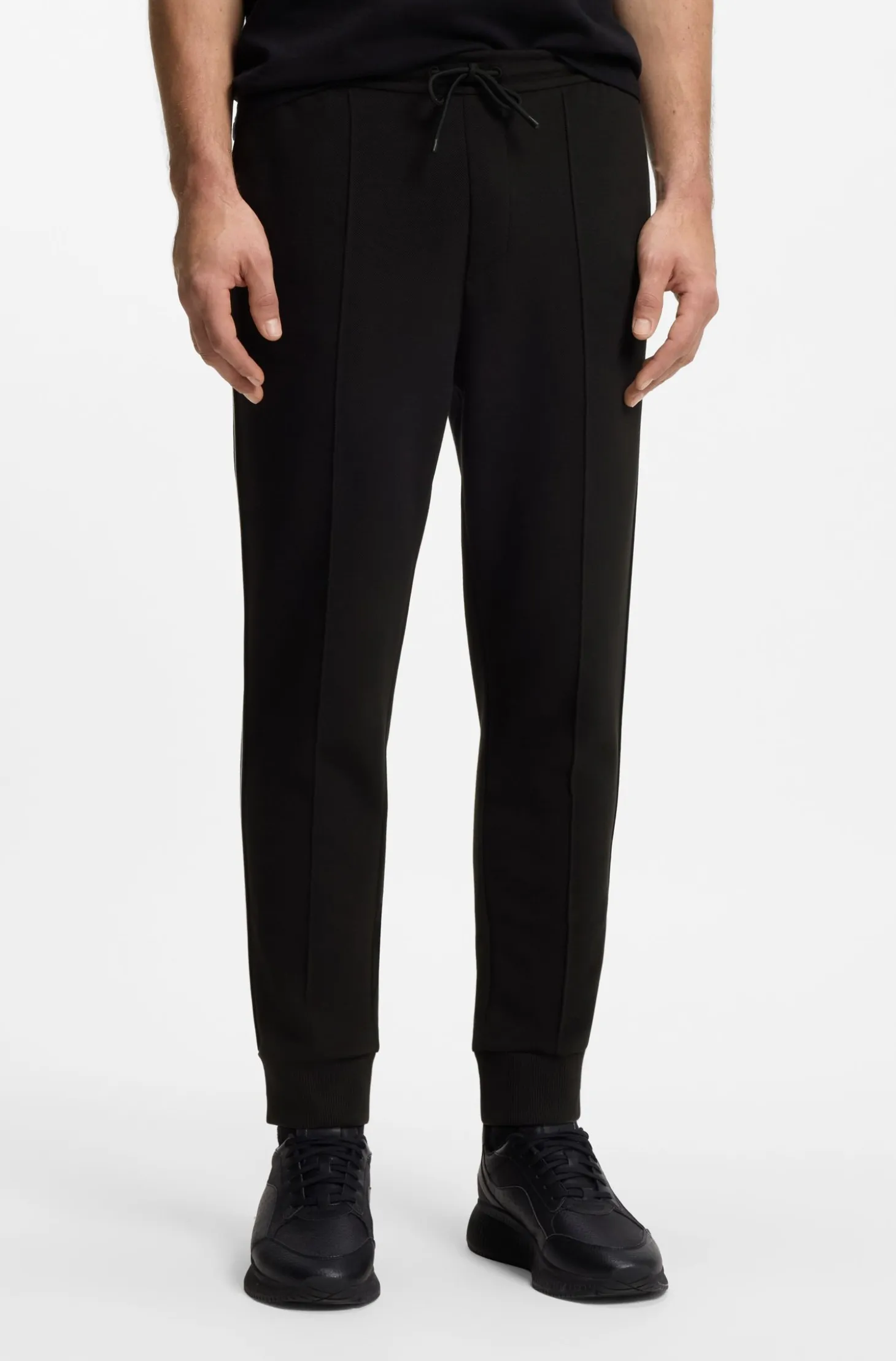 Cotton-blend tracksuit bottoms with piping details