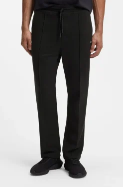 Cotton-blend tracksuit bottoms with pintuck pleats