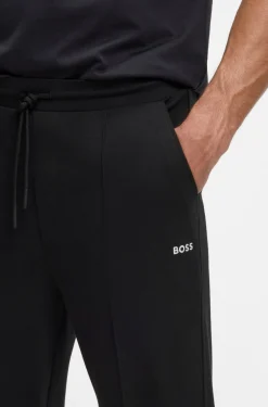 Cotton-blend tracksuit bottoms with pintuck pleats