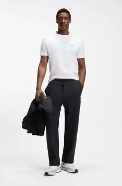 Cotton-blend tracksuit bottoms with tennis-themed logo