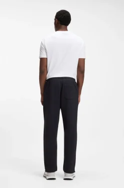 Cotton-blend tracksuit bottoms with tennis-themed logo