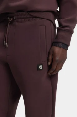 Cotton-blend tracksuit bottoms with stacked logo