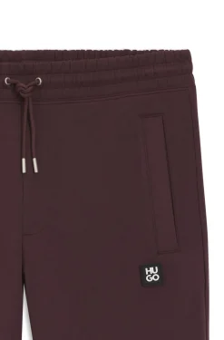 Cotton-blend tracksuit bottoms with stacked logo