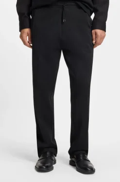 Cotton-blend tracksuit bottoms with drop-needle stripe