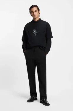 Cotton-blend tracksuit bottoms with drop-needle stripe