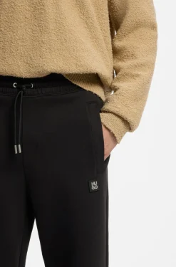 Cotton-blend tracksuit bottoms with stacked logo