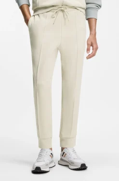 Cotton-blend tracksuit bottoms with piping details