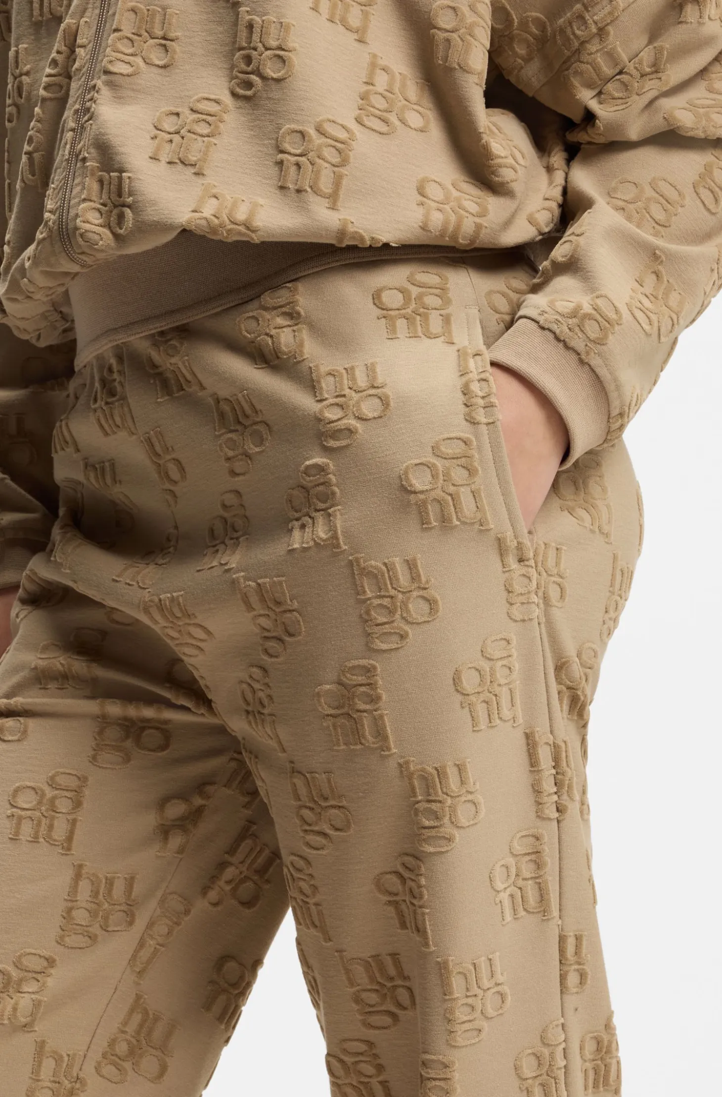 Cotton-blend tracksuit bottoms with all-over logo pattern