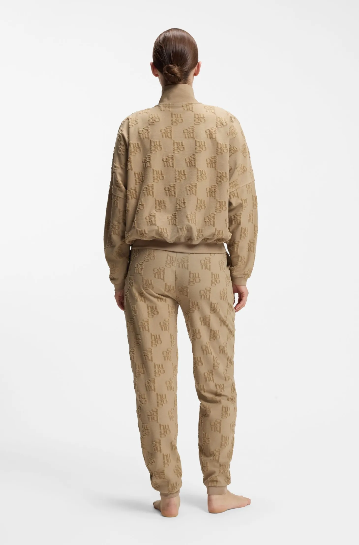 Cotton-blend tracksuit bottoms with all-over logo pattern