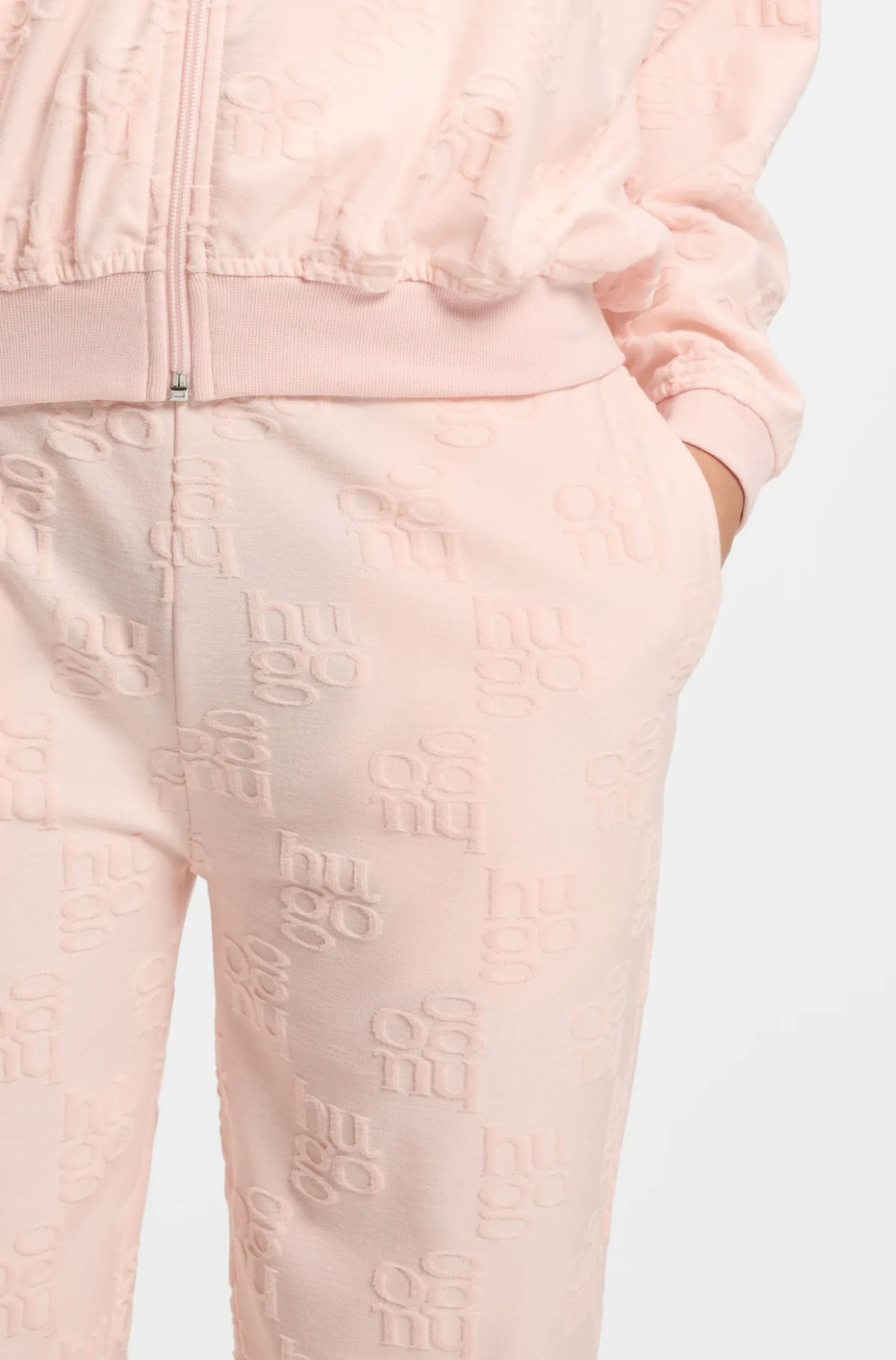 Cotton-blend tracksuit bottoms with all-over logo pattern