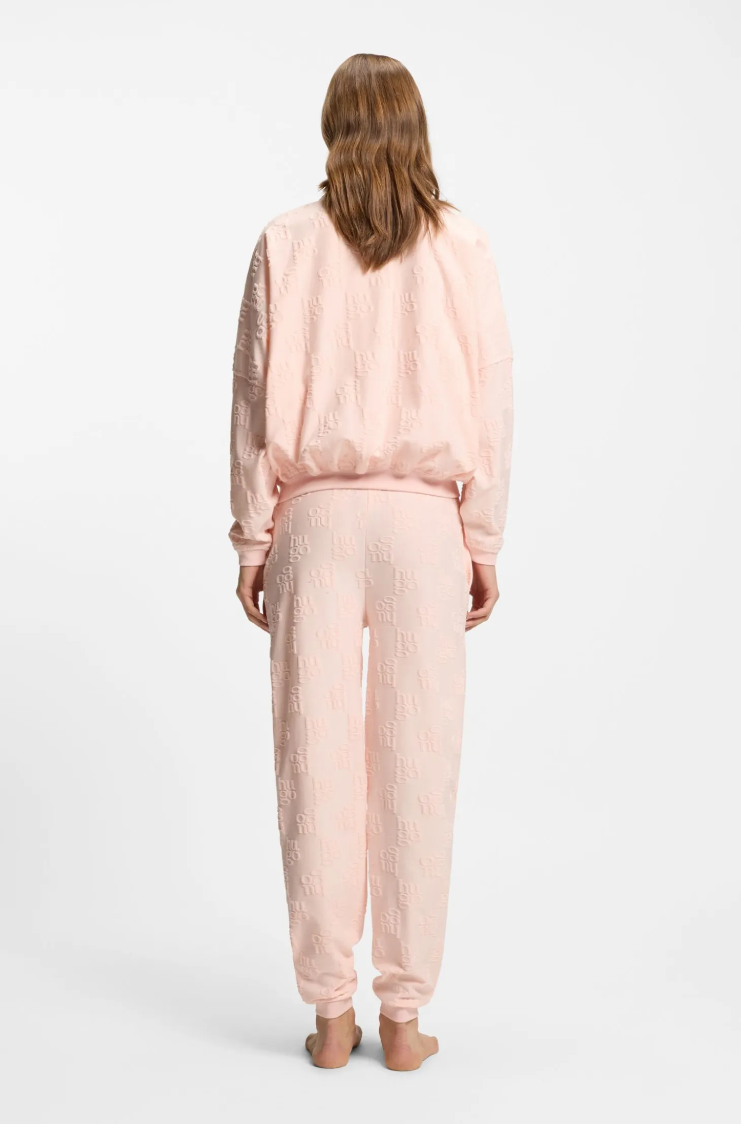 Cotton-blend tracksuit bottoms with all-over logo pattern