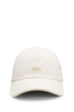 Cotton cap with metal logo lettering