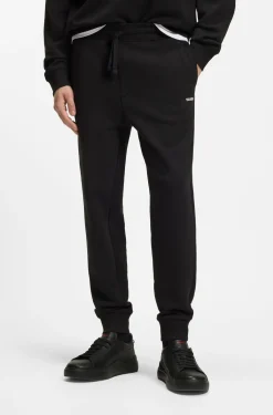 Cotton casual trousers with elasticated cuffs