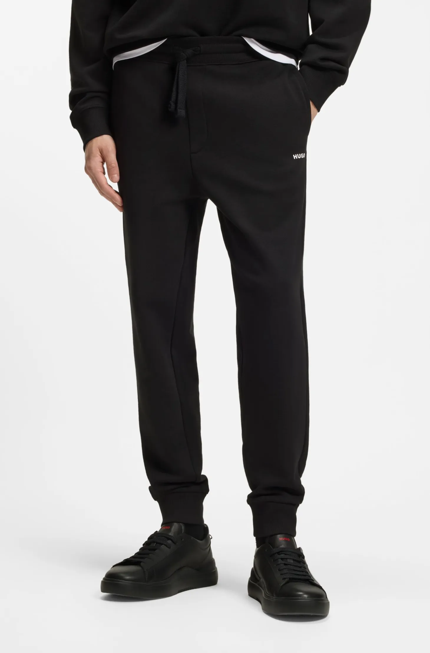 Cotton casual trousers with elasticated cuffs
