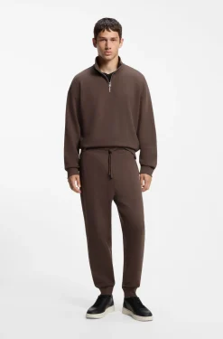 Cotton casual trousers with elasticated cuffs